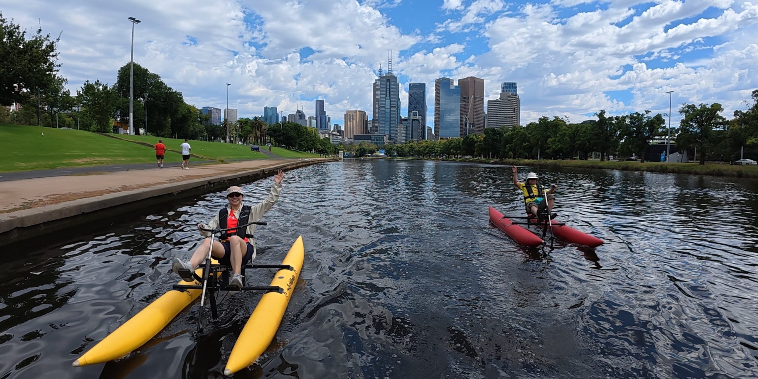 Guided couple waterbiking on Yarra River in Melbourne